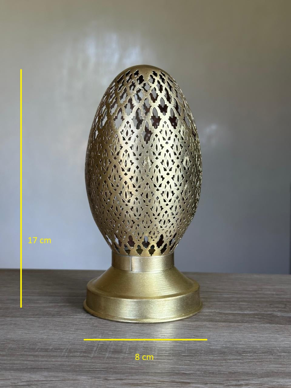 Handcrafted Brass Candle Holder with Oval Shape and Floral Lattice Cutouts