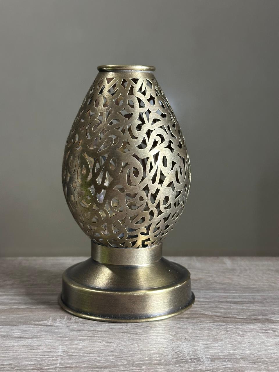 Handcrafted Brass Candle Holder with Teardrop Shape and Arabesque Cutouts