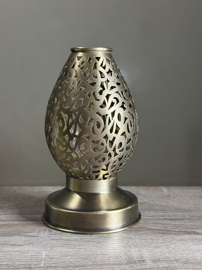 Handcrafted Brass Candle Holder with Teardrop Shape and Arabesque Cutouts