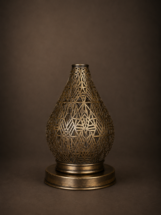 Handcrafted Brass Candle Holder with Teardrop Shape and Geometric Cutouts