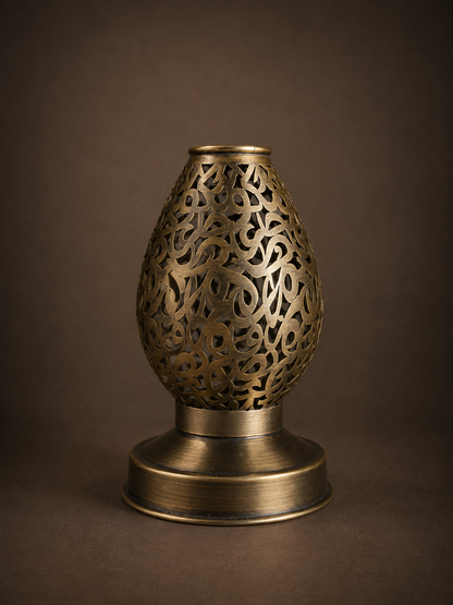Handcrafted Brass Candle Holder with Teardrop Shape and Arabesque Cutouts