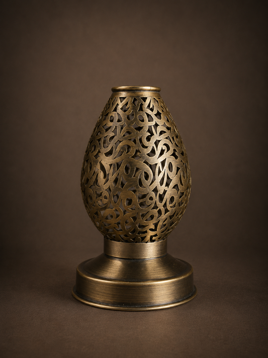Handcrafted Brass Candle Holder with Teardrop Shape and Arabesque Cutouts