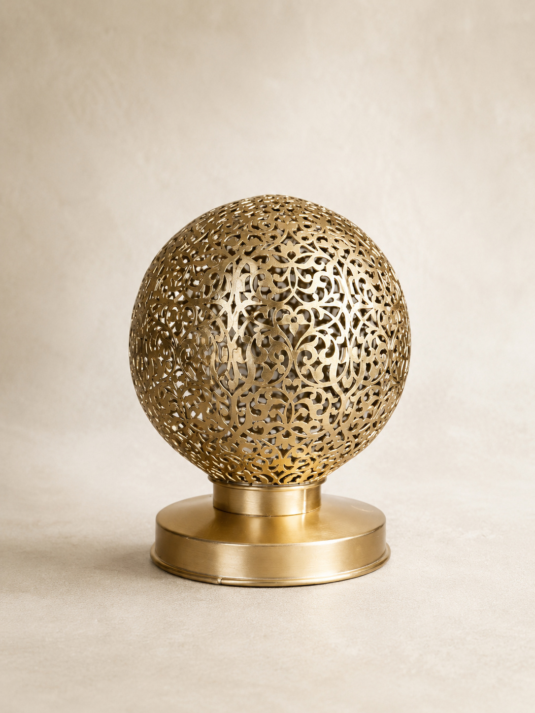 Handcrafted Brass Candle Holder with Round Shape and Arabesque Cutouts