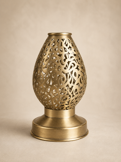 Handcrafted Brass Candle Holder with Teardrop Shape and Arabesque Cutouts