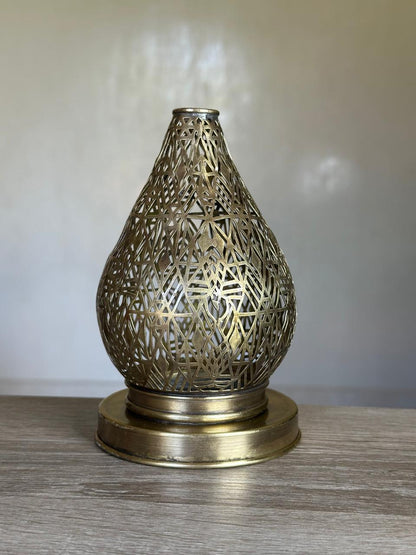 Handcrafted Brass Candle Holder with Teardrop Shape and Geometric Cutouts