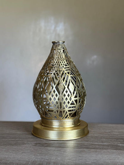 Handcrafted Brass Candle Holder with Teardrop Shape and Geometric Cutouts