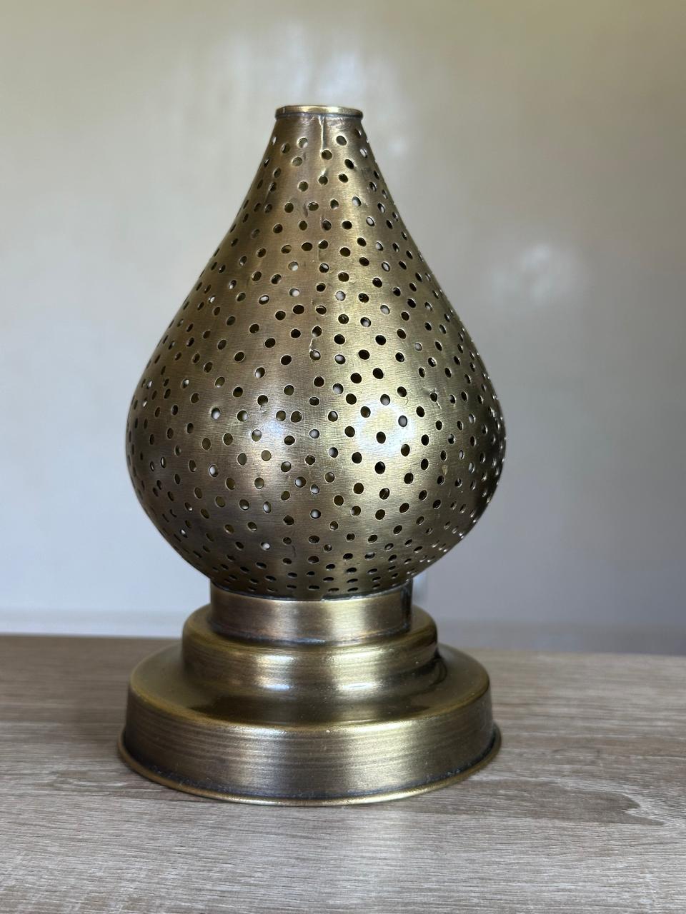 Handcrafted Brass Candle Holder with Teardrop Shape and Round Perforations