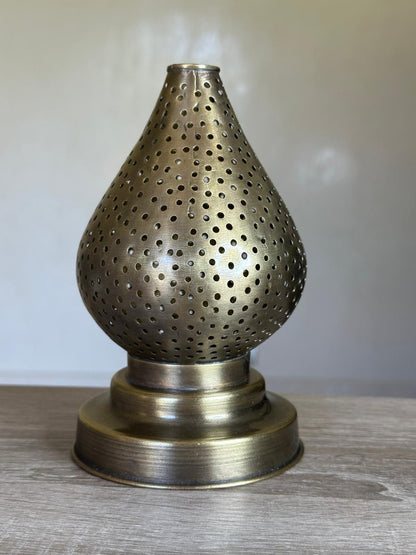 Handcrafted Brass Candle Holder with Teardrop Shape and Round Perforations