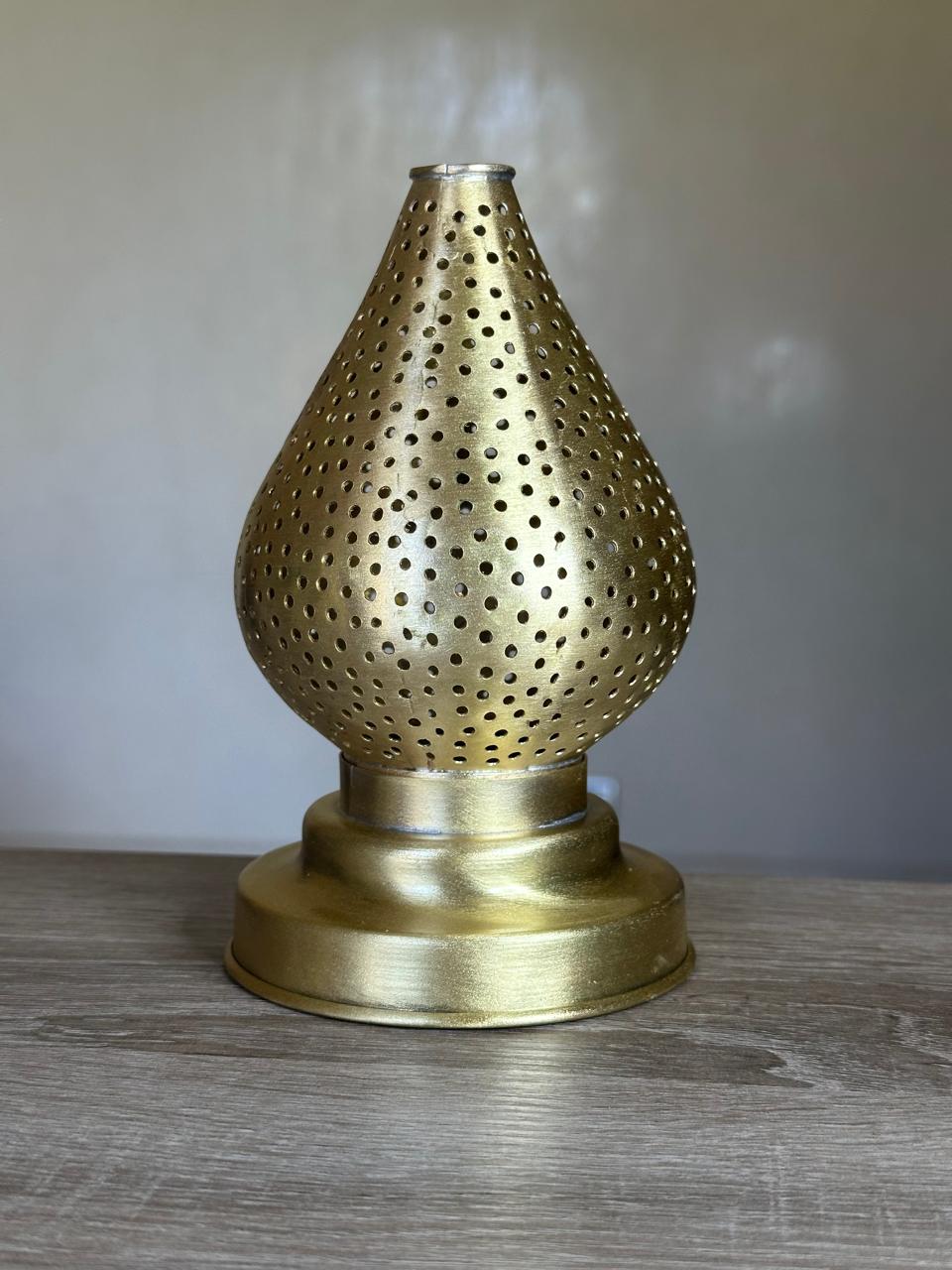 Handcrafted Brass Candle Holder with Teardrop Shape and Round Perforations