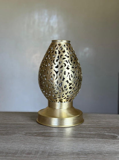 Handcrafted Brass Candle Holder with Teardrop Shape and Arabesque Cutouts