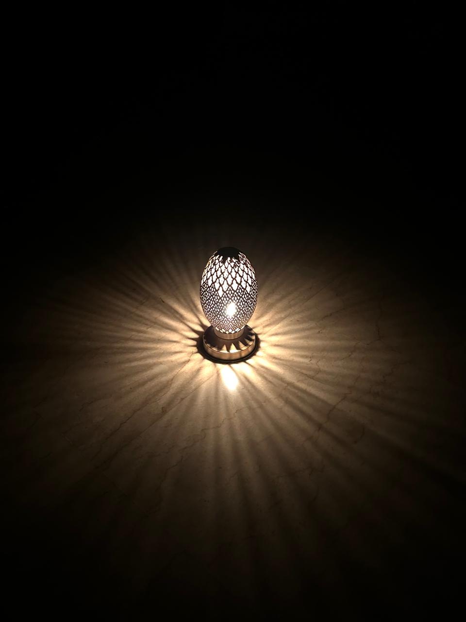 Handcrafted Brass Candle Holder with Oval Shape and Floral Lattice Cutouts