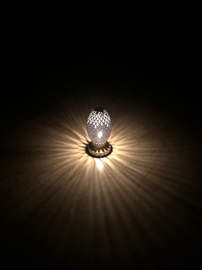 Handcrafted Brass Candle Holder with Oval Shape and Floral Lattice Cutouts