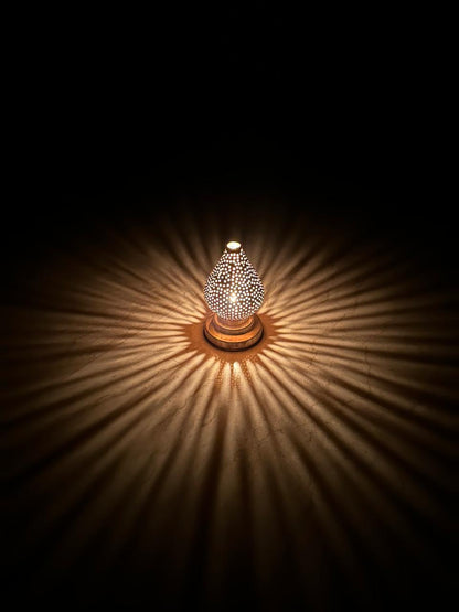 Handcrafted Brass Candle Holder with Teardrop Shape and Round Perforations