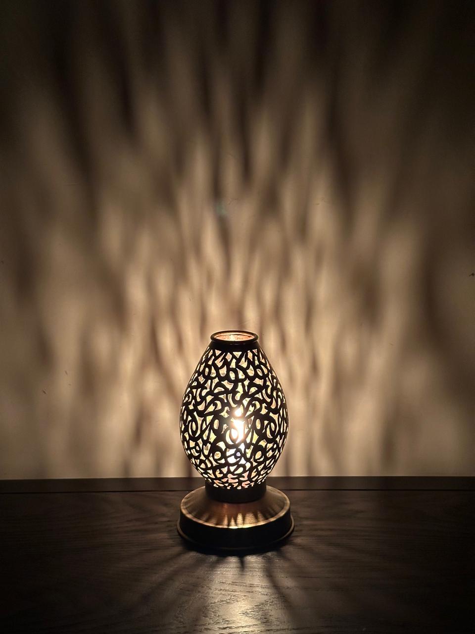 Handcrafted Brass Candle Holder with Teardrop Shape and Arabesque Cutouts